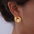 Дамски обеци Orbit Pearl SS25-https://detail.1688.com/offer/879317053704.html?_t=1745487065003&spm=a2615.7691456.co_0_0_wangpu_score_0_0_0_0_0_0_0000_1.0-Thedresscode