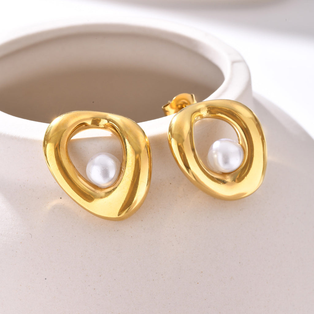 Дамски обеци Orbit Pearl SS25-https://detail.1688.com/offer/879317053704.html?_t=1745487065003&spm=a2615.7691456.co_0_0_wangpu_score_0_0_0_0_0_0_0000_1.0-Thedresscode